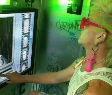 Participant using a touchscreen inside a brightly lit interactive booth.