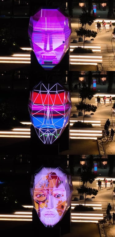 Three views of an illuminated head sculpture displaying different geometric and portrait patterns.